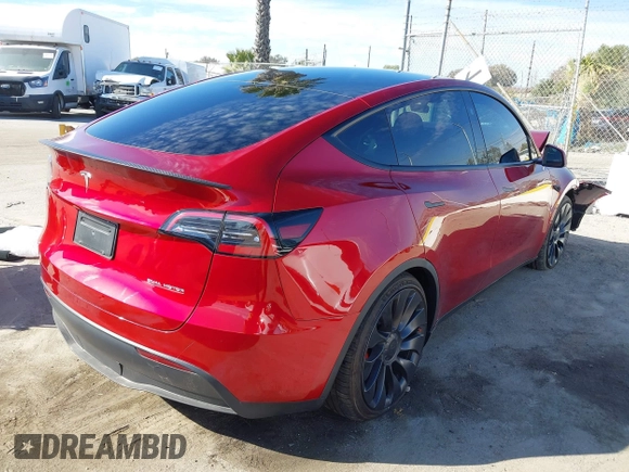 2024 Tesla Model Y Performance with VIN 7SAYGDEF3RF032980, listed as a IAAI auction lot 41619450 with 12,105 mi miles and . Bid and sale history available at DreamBid. Image 4.