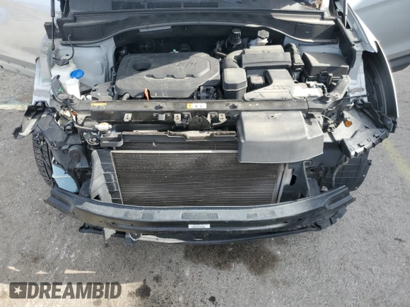 2017 Hyundai Santa Fe 2.4L z VIN 5XYZT3LB2HG392689, wystawiony jako Copart lot #59354795 z przebiegiem 54 525 mil mil oraz Szkoda całkowita • Salvage title. Historia ofert i sprzedaży dostępna na DreamBid. Obrazek 12.