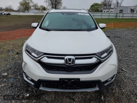2019 Honda CR-V Touring with VIN 2HKRW2H91KH633732, listed as a Copart auction lot 52750975 with 58,642 mi miles and Salvage Title. Bid and sale history available at carsss.com. Image 5.