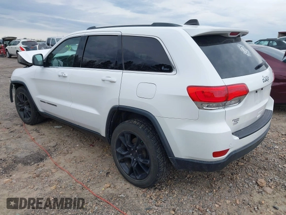 2018 Jeep Grand Cherokee Laredo E with VIN 1C4RJEAG7JC322888, listed as a IAAI auction lot 41756833 with 129,988 mi miles and . Bid and sale history available at DreamBid. Image 3.