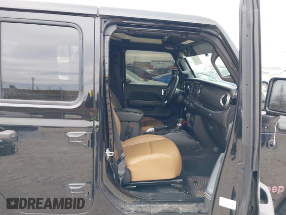 2022 Jeep Gladiator Rubicon with VIN 1C6JJTBG7NL145501, listed as a IAAI auction lot 41506842 with 20,593 mi miles and . Bid and sale history available at DreamBid. Image 5.