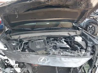 2024 Lexus TX 350 with VIN 5TDAAAB63RS002392, listed as a IAAI auction lot 42384641 with 62,857 mi miles and . Bid and sale history available at DreamBid. Image 10.
