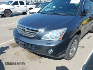 2006 Lexus RX 400h with VIN JTJHW31U560009707, listed as a IAAI auction lot 42148672 with 198,569 mi miles and . Bid and sale history available at DreamBid. Image 6.