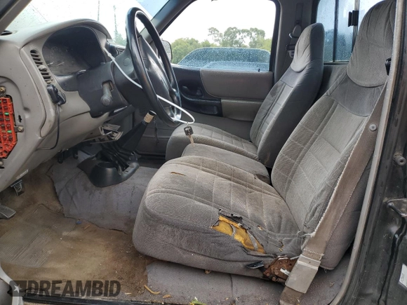 1996 Ford Ranger XL z VIN 1FTCR10A3TUC37158, wystawiony jako Copart lot #64003065 z przebiegiem 219 982 mil mil oraz Szkoda całkowita • Salvage title. Historia ofert i sprzedaży dostępna na DreamBid. Obrazek 7.