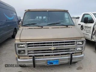1989 Chevrolet Chevy Van z VIN 1GBEG25K2K7120100, wystawiony jako Copart lot #75508934 z przebiegiem Nie podano mil oraz Szkody całkowita. Historia ofert i sprzedaży dostępna na DreamBid. Obrazek 5.