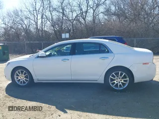 2012 Chevrolet Malibu LTZ with VIN 1G1ZG5E7XCF378648, listed as a IAAI auction lot 41596653 with 172,279 mi miles and . Bid and sale history available at DreamBid. Image 14.