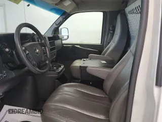 2013 Chevrolet Express Cargo with VIN 1GCSGAFX5D1110945, listed as a IAAI auction lot 42635460 with 239,048 mi miles and . Bid and sale history available at DreamBid. Image 3.