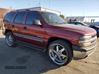 2003 Chevrolet Tahoe LS with VIN 1GNEC13T43R142268, listed as a Copart auction lot 88926345 with 202,145 mi miles and Salvage Title. Bid and sale history available at carsss.com. Image 4.