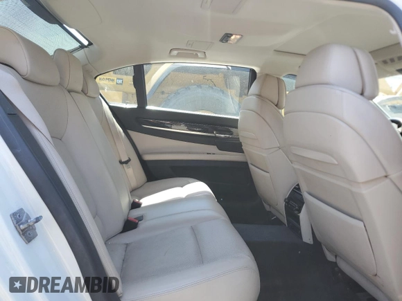 2012 BMW 7 Series 750Li xDrive z VIN WBAKC8C54CC434833, wystawiony jako Copart lot #54531455 z przebiegiem 110 959 mil mil oraz Szkoda całkowita • Salvage title. Historia ofert i sprzedaży dostępna na DreamBid. Obrazek 10.