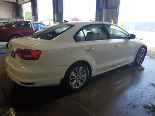 2015 Volkswagen Jetta SE with VIN 3VWD17AJ5FM256703, listed as a Copart auction lot 62699375 with 130,247 mi miles and Salvage title. Bid and sale history available at DreamBid. Image 3.