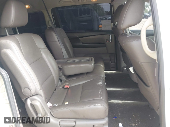 2015 Honda Odyssey Touring Elite with VIN 5FNRL5H96FB045968, listed as a IAAI auction lot 42263637 with 207,637 mi miles and . Bid and sale history available at DreamBid. Image 8.