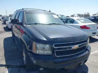 2011 Chevrolet Suburban LT with VIN 1GNSCJE0XBR285973, listed as a IAAI auction lot 42007844 with 252,994 mi miles. Bid and sale history available at carsss.com. Image 1.