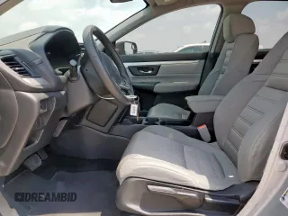 2019 Honda CR-V LX z VIN 2HKRW5H32KH406837, wystawiony jako Copart lot #57111585 z przebiegiem 123 047 mil mil oraz Szkoda całkowita • Salvage title. Historia ofert i sprzedaży dostępna na DreamBid. Obrazek 7.