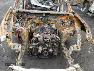 2011 Infiniti FX z VIN JN8AS1MW0BM142254, wystawiony jako Copart lot #55926595 z przebiegiem Nie podano mil oraz Szkoda całkowita • Salvage title. Historia ofert i sprzedaży dostępna na DreamBid. Obrazek 12.