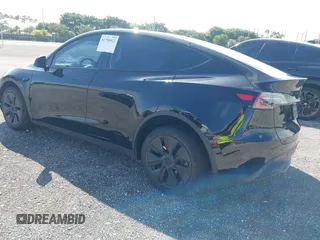 2024 Tesla Model Y z VIN 7SAYGDED6RF191135, wystawiony jako IAAI lot #41790922 z przebiegiem 17 154 mil mil oraz . Historia ofert i sprzedaży dostępna na DreamBid. Obrazek 3.