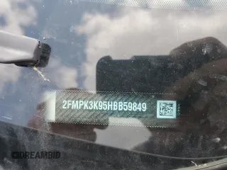 2017 Ford Edge Titanium z VIN 2FMPK3K95HBB59849, wystawiony jako Copart lot #54627325 z przebiegiem 136 548 mil mil oraz Szkoda całkowita • Salvage title. Historia ofert i sprzedaży dostępna na DreamBid. Obrazek 13.