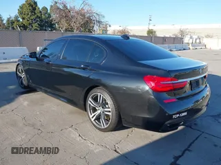 2018 BMW 7 Series 750i with VIN WBA7F0C50JGM24160, listed as a IAAI auction lot 41448519 with 138,742 mi miles. Bid and sale history available at carsss.com. Image 3.