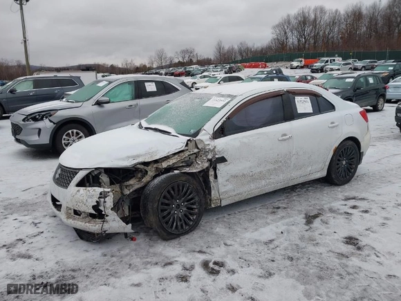 2012 Suzuki Kizashi SE with VIN JS2RF9A37C6100123, listed as a IAAI auction lot 41523931 with 127,363 mi miles. Bid and sale history available at carsss.com. Image 2.