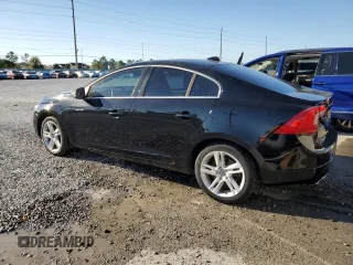 2015 Volvo S60 T5 Drive-E Premier with VIN YV140MFK4F2338462, listed as a Copart auction lot 48485665 with 57,695 mi miles and Salvage title. Bid and sale history available at DreamBid. Image 2.