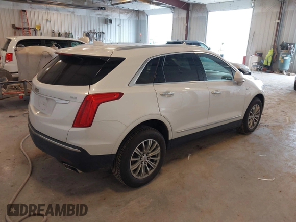 2018 Cadillac XT5 Luxury AWD z VIN 1GYKNDRS9JZ248969, wystawiony jako IAAI lot #42463156 z przebiegiem 90 271 mil mil oraz . Historia ofert i sprzedaży dostępna na DreamBid. Obrazek 4.
