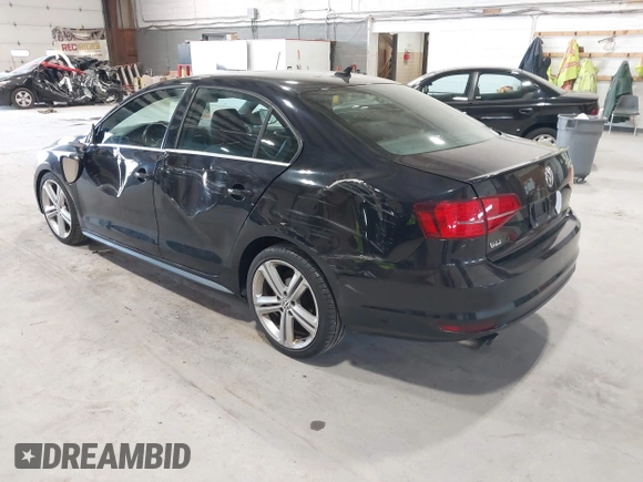 2015 Volkswagen Jetta Sedan 2.0T GLI SE with VIN 3VW5T7AJ0FM275867, listed as a IAAI auction lot 42133491 with 98,718 mi miles. Bid and sale history available at carsss.com. Image 3.