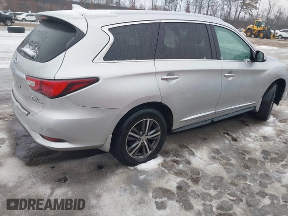 2016 Infiniti QX60 with VIN 5N1AL0MMXGC505959, listed as a IAAI auction lot 41513268 with 130,142 mi miles and . Bid and sale history available at DreamBid. Image 4.