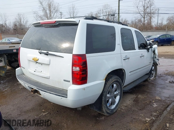 2009 Chevrolet Tahoe LTZ with VIN 1GNFK33079R293963, listed as a IAAI auction lot 41662695 with 185,408 mi miles and . Bid and sale history available at DreamBid. Image 4.