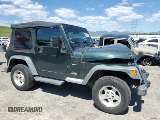 2002 Jeep Wrangler Sport с VIN 1J4FA49SX2P738105, выставлен на аукционе Copart как лот 60320775 с пробегом 402 518 миль миль и Списание • Salvage title. История ставок и продаж доступна на DreamBid. Изображение 4.