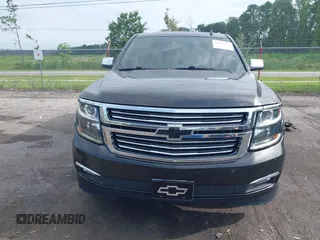 2015 Chevrolet Tahoe LTZ with VIN 1GNSCCKC5FR103676, listed as a IAAI auction lot 42456913 with 214,009 mi miles and . Bid and sale history available at DreamBid. Image 11.