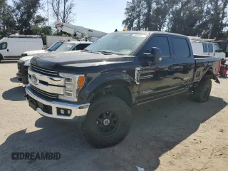 2019 Ford F-350 XL with VIN 1FT8W3BT0KED37509, listed as a Copart auction lot 60283655 with 122,571 mi miles and Salvage title. Bid and sale history available at DreamBid. Image 1.