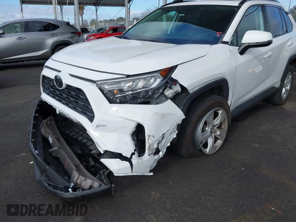 2019 Toyota RAV4 XLE with VIN 2T3W1RFV5KW051023, listed as a IAAI auction lot 40970612 with 106,359 mi miles and . Bid and sale history available at DreamBid. Image 6.