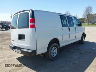2019 Chevrolet Express Cargo Van with VIN 1GCWGAFG7K1196113, listed as a IAAI auction lot 41961791 with 80,015 mi miles. Bid and sale history available at carsss.com. Image 4.