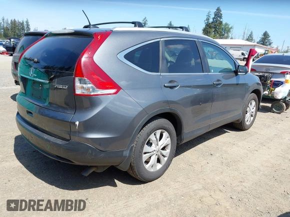 2014 Honda CR-V EX-L with VIN 5J6RM4H79EL077096, listed as a IAAI auction lot 42153513 with 104,972 mi miles and . Bid and sale history available at DreamBid. Image 4.