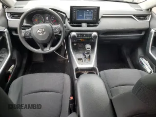 2019 Toyota RAV4 LE with VIN JTMG1RFV4KD004180, listed as a Copart auction lot 57127095 with 71,454 mi miles and Salvage title. Bid and sale history available at DreamBid. Image 8.