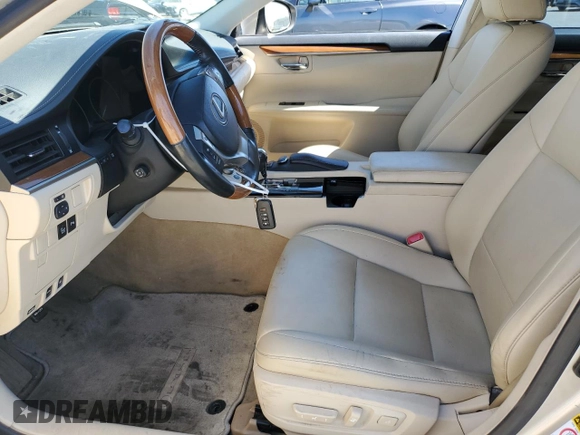 2013 Lexus ES 300h with VIN JTHBW1GG1D2011128, listed as a Copart auction lot 58246565 with 128,242 mi miles and Salvage title. Bid and sale history available at DreamBid. Image 7.