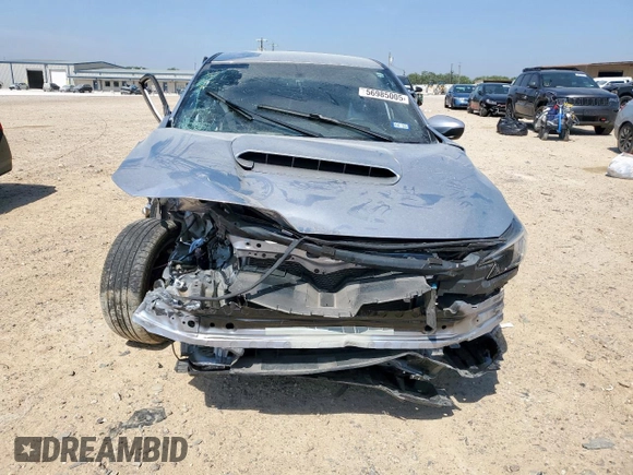 2022 Subaru WRX with VIN JF1VBAA64N9027221, listed as a Copart auction lot 56985005 with 22,787 mi miles and Salvage title. Bid and sale history available at DreamBid. Image 5.