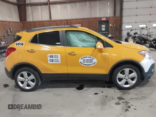 2016 Buick Encore Convenience with VIN KL4CJFSB9GB690206, listed as a IAAI auction lot 42053722 with 116,882 mi miles. Bid and sale history available at carsss.com. Image 13.
