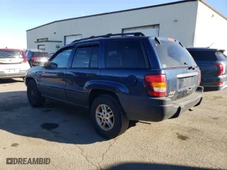 2003 Jeep Grand Cherokee Laredo with VIN 1J4GW48S13C588269, listed as a Copart auction lot 42303735 with 205,121 mi miles and Salvage Title. Bid and sale history available at carsss.com. Image 2.