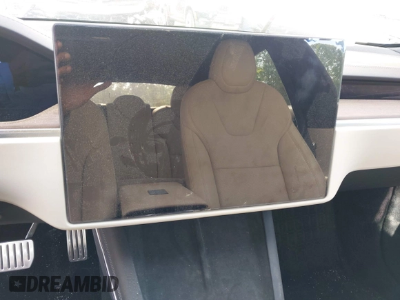 2022 Tesla Model S with VIN 5YJSA1E57NF462175, listed as a IAAI auction lot 42231439 with Not provided miles and . Bid and sale history available at DreamBid. Image 7.