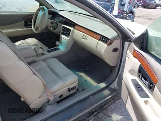1994 Cadillac Eldorado ESC z VIN 1G6EL12Y4RU604343, wystawiony jako IAAI lot #42221885 z przebiegiem Nie podano mil oraz . Historia ofert i sprzedaży dostępna na DreamBid. Obrazek 5.