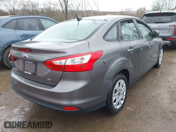 2012 Ford Focus SE with VIN 1FAHP3F26CL220986, listed as a IAAI auction lot 41719127 with 127,050 mi miles and . Bid and sale history available at DreamBid. Image 4.