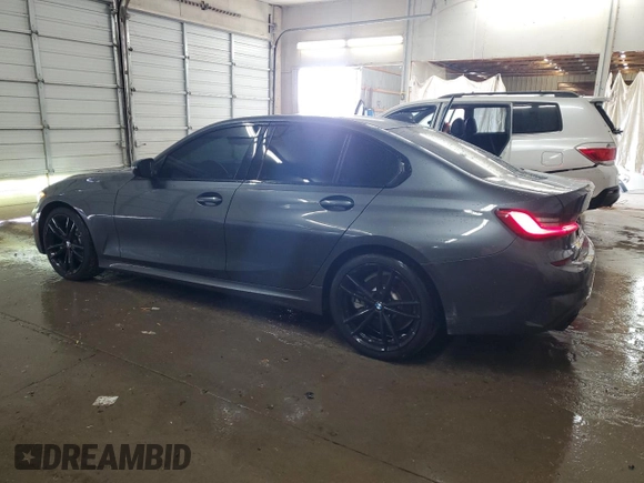 2019 BMW 3 Series 330i xDrive with VIN WBA5R7C57KAJ86027, listed as a Copart auction lot 61203435 with 41,486 mi miles and Salvage title. Bid and sale history available at DreamBid. Image 2.