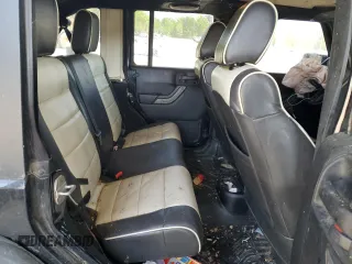 2011 Jeep Wrangler Unlimited Sport with VIN 1J4HA3H19BL574932, listed as a Copart auction lot 53250465 with 113,344 mi miles and Salvage Title. Bid and sale history available at carsss.com. Image 10.