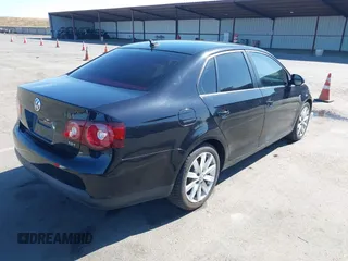 2010 Volkswagen Jetta Wolfsburg Edition with VIN 3VWRA7AJ8AM095259, listed as a IAAI auction lot 42190280 with 96,310 mi miles and . Bid and sale history available at DreamBid. Image 4.