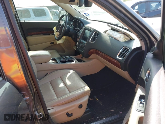 2014 Dodge Durango Citadel with VIN 1C4RDHEG2EC381324, listed as a IAAI auction lot 42021611 with 104,178 mi miles and . Bid and sale history available at DreamBid. Image 5.