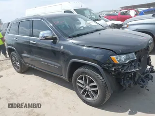 2018 Jeep Grand Cherokee Limited with VIN 1C4RJFBG8JC454742, listed as a IAAI auction lot 42063219 with 128,971 mi miles and . Bid and sale history available at DreamBid. Image 1.