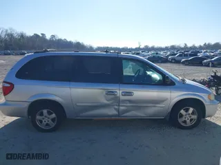 2005 Dodge Caravan SXT with VIN 2D4GP44L45R477780, listed as a IAAI auction lot 41654075 with 166,060 mi miles. Bid and sale history available at carsss.com. Image 13.