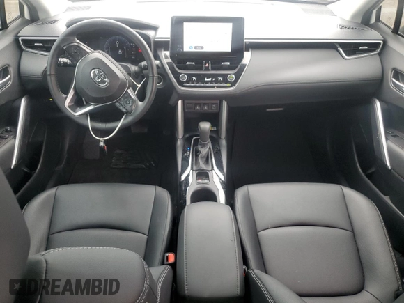 2023 Toyota Corolla Cross XLE with VIN 7MUDAABG3PV044005, listed as a Copart auction lot 54955225 with 50,712 mi miles and Salvage title. Bid and sale history available at DreamBid. Image 8.