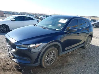 2017 Mazda CX-5 Touring with VIN JM3KFACL5H0180243, listed as a IAAI auction lot 41990818 with 158,977 mi miles. Bid and sale history available at carsss.com. Image 17.
