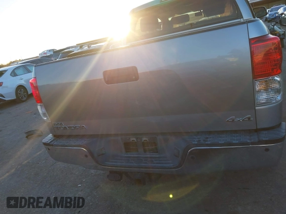 2013 Toyota Tundra Limited z VIN 5TFHY5F10DX277740, wystawiony jako IAAI lot #41085086 z przebiegiem 244 200 mil mil oraz . Historia ofert i sprzedaży dostępna na DreamBid. Obrazek 16.